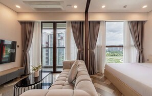 Deluxe Apartment, 1 Bedroom, City View | Premium bedding, down duvets, memory-foam beds, in-room safe - The Galleria Residence-ANGIA Hospitality (Ho Chi Minh City)