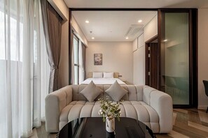 Deluxe Apartment, 1 Bedroom, City View | Living area | 42-inch Smart TV with digital channels, Netflix, streaming services - The Galleria Residence-ANGIA Hospitality (Ho Chi Minh City)