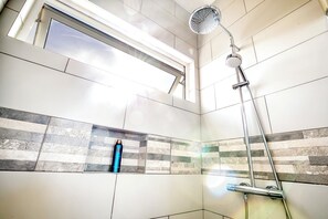 Shower, hair dryer, towels, soap