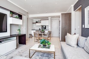 Luxury Apartment | Living area | Smart TV, Netflix, streaming services - Oasis Apartments at Masingita Towers (Sandton)