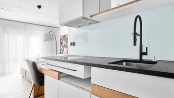 Fridge, microwave, stovetop, coffee/tea maker