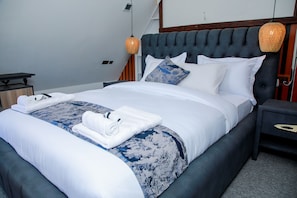 Family Suite, Multiple Beds, Non Smoking, Balcony | Premium bedding, down comforters, Tempur-Pedic beds - Fortunas Cabins (Nkubu)