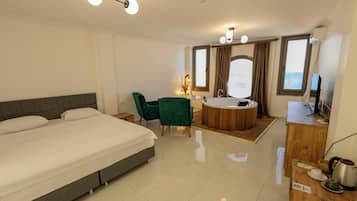 Design kamer, 1 queensize bed, uitzicht op zee | Luxe beddengoed, gratis wifi, beddengoed