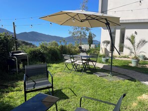 Outdoor dining - Bas De Villa 60m² + Jardin au Golfe de Lava (Appietto)