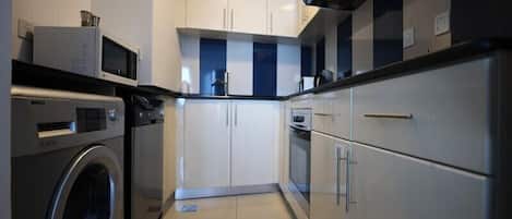Standard Apartment | Private kitchen | Full-size fridge, microwave, oven, dishwasher