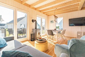 Télévision, cheminée, vidéothèque