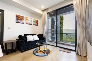 Deluxe Apartment | Living area - KN Apartment in Lumiere Riverside (Ho Chi Minh City)