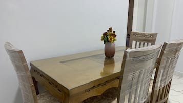 Deluxe Apartment | Living area | Flat-screen TV, DVD player