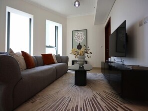Living area - Elegant 1BR Oasis Burj Vista (Dubai)