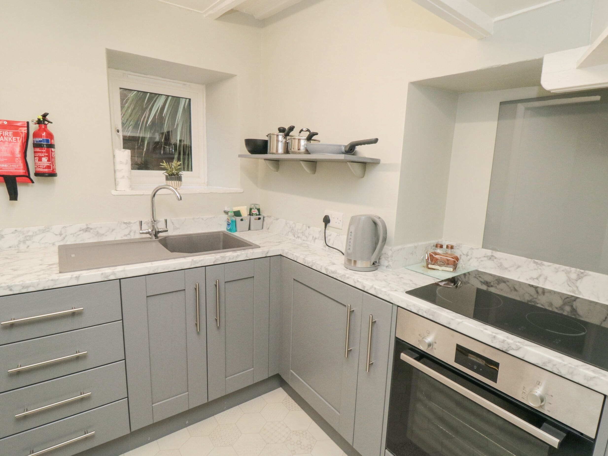 Fridge, electric kettle, toaster, cookware/dishes/utensils