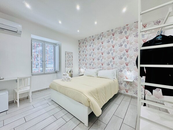 Habitación | Escritorio, wifi gratis y ropa de cama 