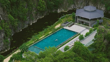 Outdoor pool, open 7:00 AM to 6:00 PM, pool umbrellas, pool loungers