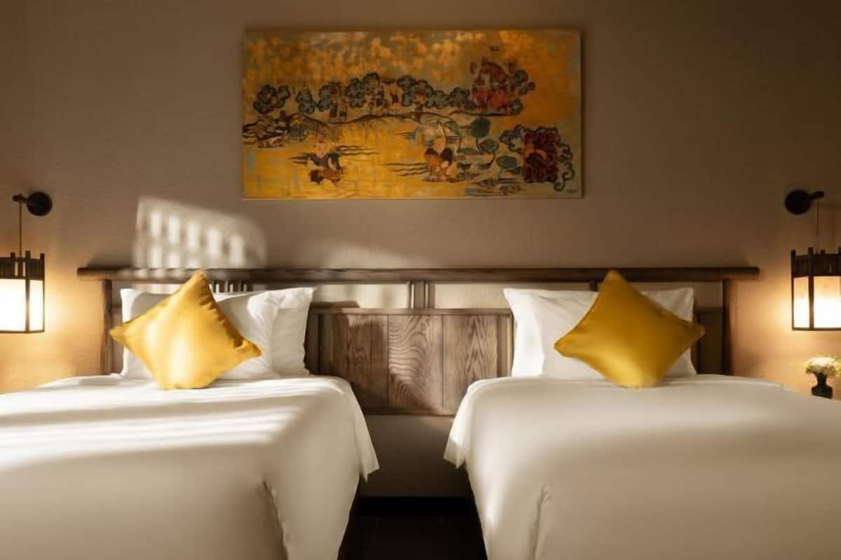 Ropa de cama hipoalergénica, minibar con artículos gratuitos, escritorio
