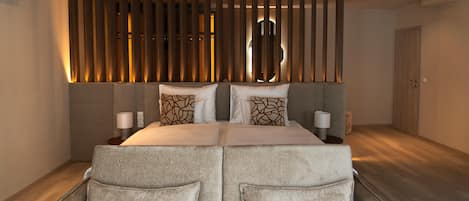 Suite Deluxe | 1 habitación, ropa de cama de alta calidad y minibar