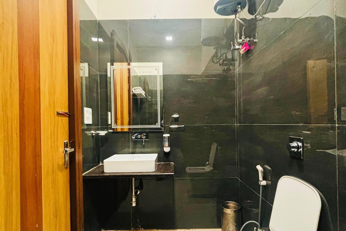 Vinn Suite | Baño | Pantuflas