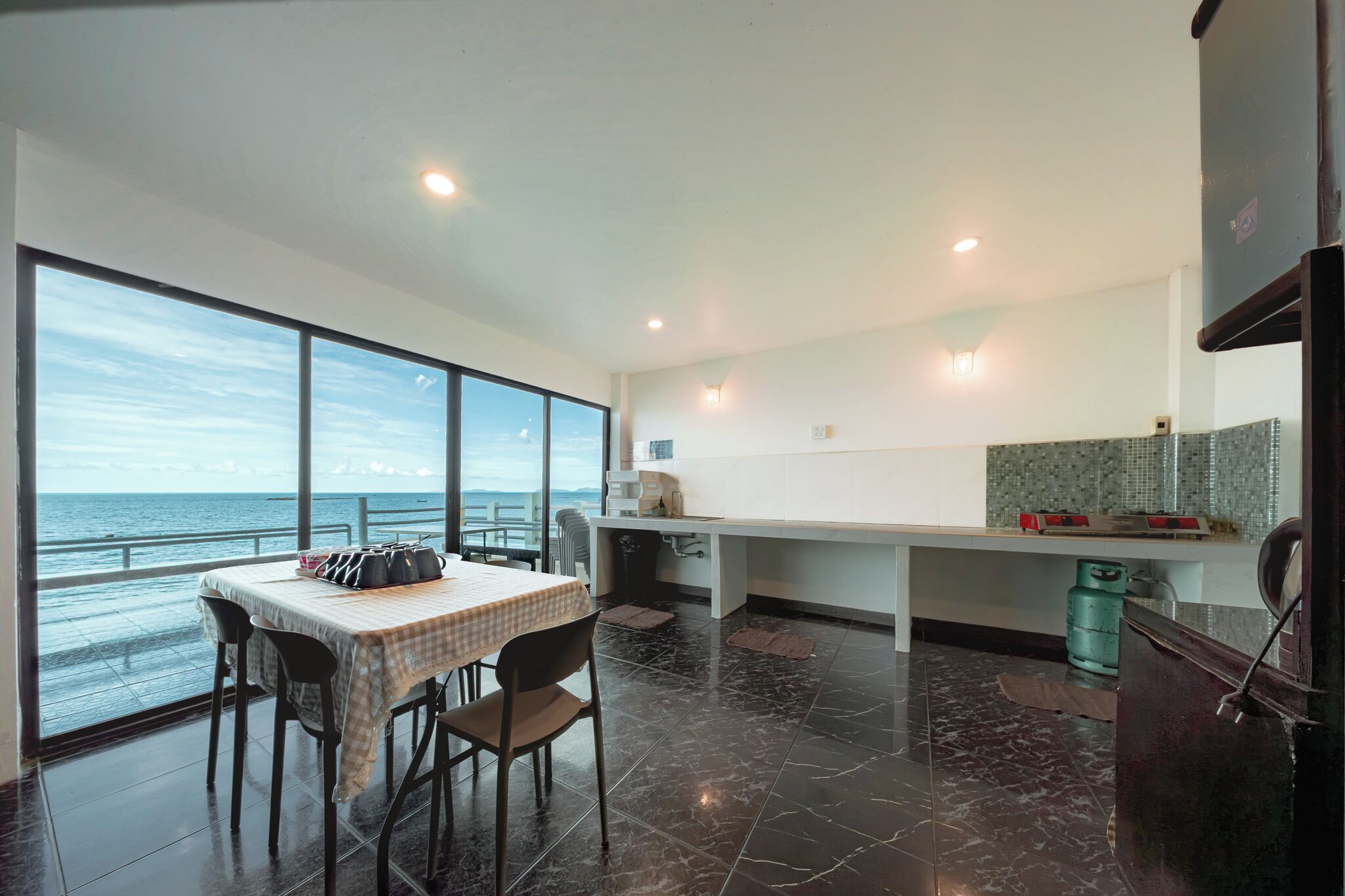 Villa | Private kitchen | Full-sized fridge, microwave, oven, griddle
