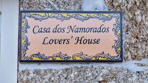 A sign for Casa dos Namorados, also known as Lovers' House.