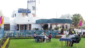 A hotel with a signboard indicating it is the Office of the District Tourism Development Officer. - Rahi Motel (Haridwar)