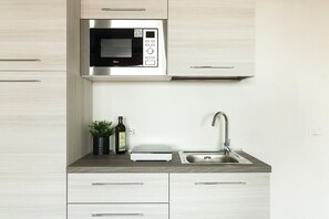 Fridge, microwave, coffee/tea maker, electric kettle