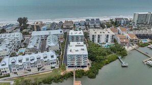 A coastal residential area with a marina and a beach. - Intracoastal and Gulf of Mexico water views from this hideaway unit complete with heated pool, hot tub & home office (Indian Shores)