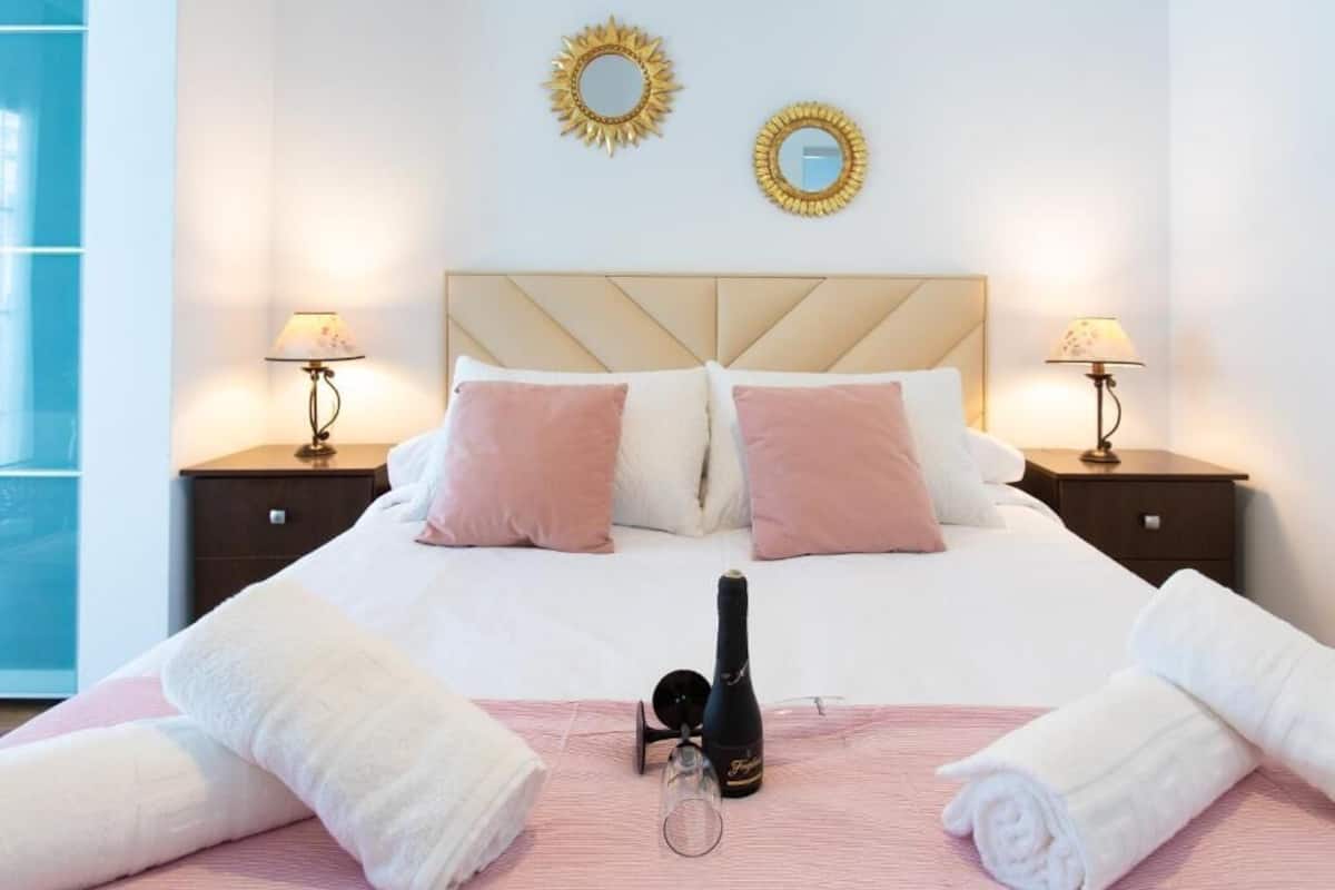 Egyptian cotton sheets, premium bedding, down duvets, minibar