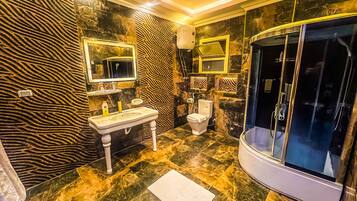 Jetted tub, hair dryer, towels, soap