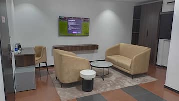Executive Room | Living area | TV