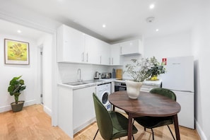 Fridge, oven, electric kettle, toaster