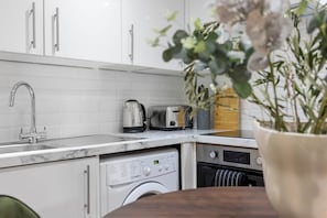 Fridge, oven, electric kettle, toaster