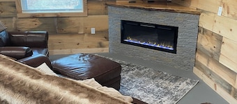 Large cabin with ATV/UTV trail access.