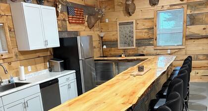 Large cabin with ATV/UTV trail access.