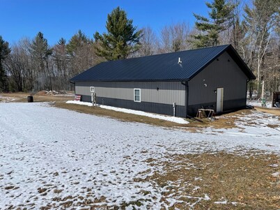Large cabin with ATV/UTV trail access.