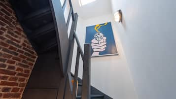 Apartamento, várias camas, cozinha, vista para a cidade | Área de estar