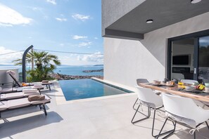 Outdoor dining - Astonishing villa Blue Horizon w heated pool (Podstrana)
