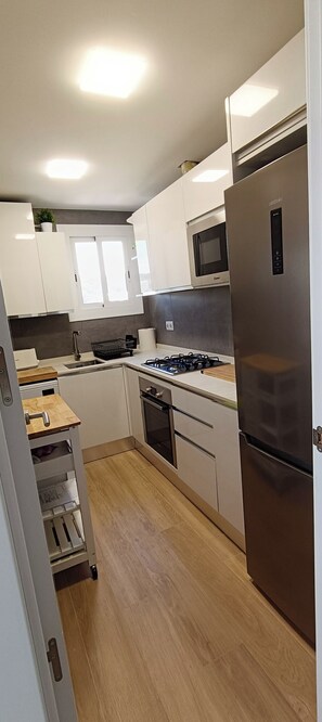 High chair, cookware/dishes/utensils, lobster pot