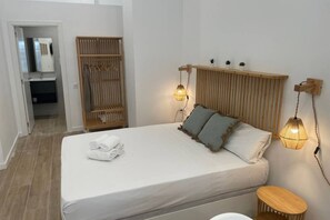 Fer et planche à repasser, Wi-Fi gratuit, draps fournis