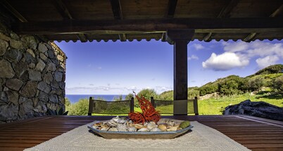Gallurese stazzu in the countryside with sea view above Li Feruli