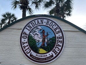 A sign with the text "City of Indian Rocks Beach, Florida" and "World's Safest Beach". - Cottage by the Sea Unit A
Indian Rocks Retreat- 3-Minute Walk to Beach- King Bed (Indian Rocks Beach)