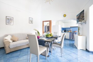 Apartment, Terrace, Sea View | Living area | 32-inch flat-screen TV with digital channels - YourHome - La vedetta Sea View (Positano)
