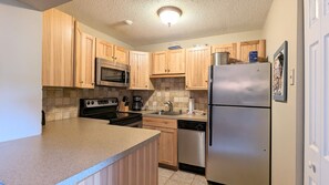 Fridge, microwave, oven, stovetop - Village at Winnipesaukee Unit 111 (Laconia)