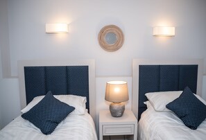 3 habitaciones, cuna de viaje, acceso a internet y ropa de cama 