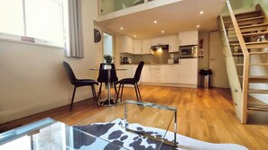 Fridge, coffee/tea maker, cookware/dishes/utensils