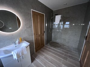 Shower, hair dryer, towels