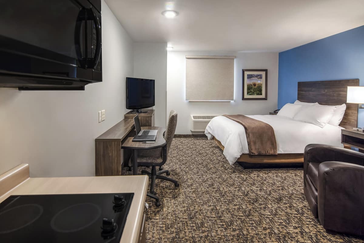 Pillow-top beds, desk, laptop workspace, blackout curtains