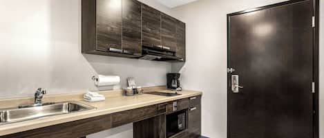 Full-size fridge, microwave, stovetop, coffee/tea maker