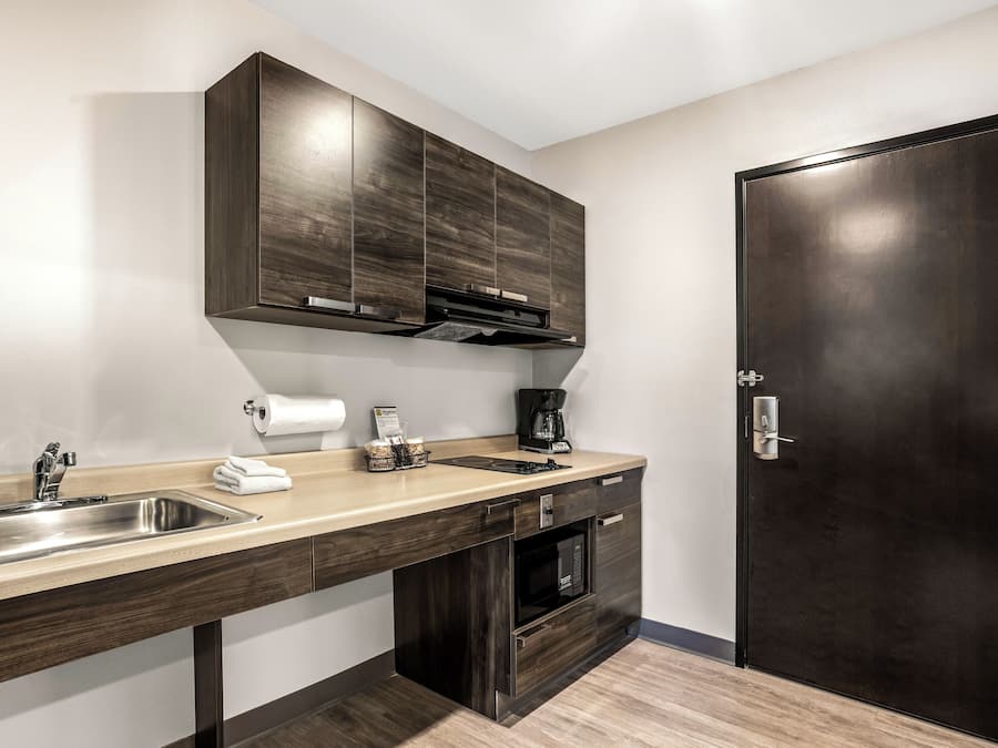 Full-size fridge, microwave, stovetop, coffee/tea maker