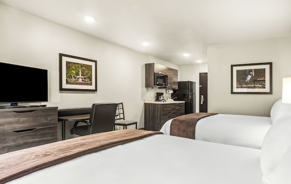 Pillow-top beds, desk, laptop workspace, blackout curtains