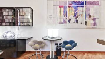 Superior Apartment | Living area | Books, stereo