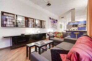 Apartemen Superior | Area keluarga | Buku dan peralatan stereo