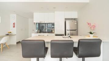 Fridge, microwave, stovetop, cookware/dishes/utensils